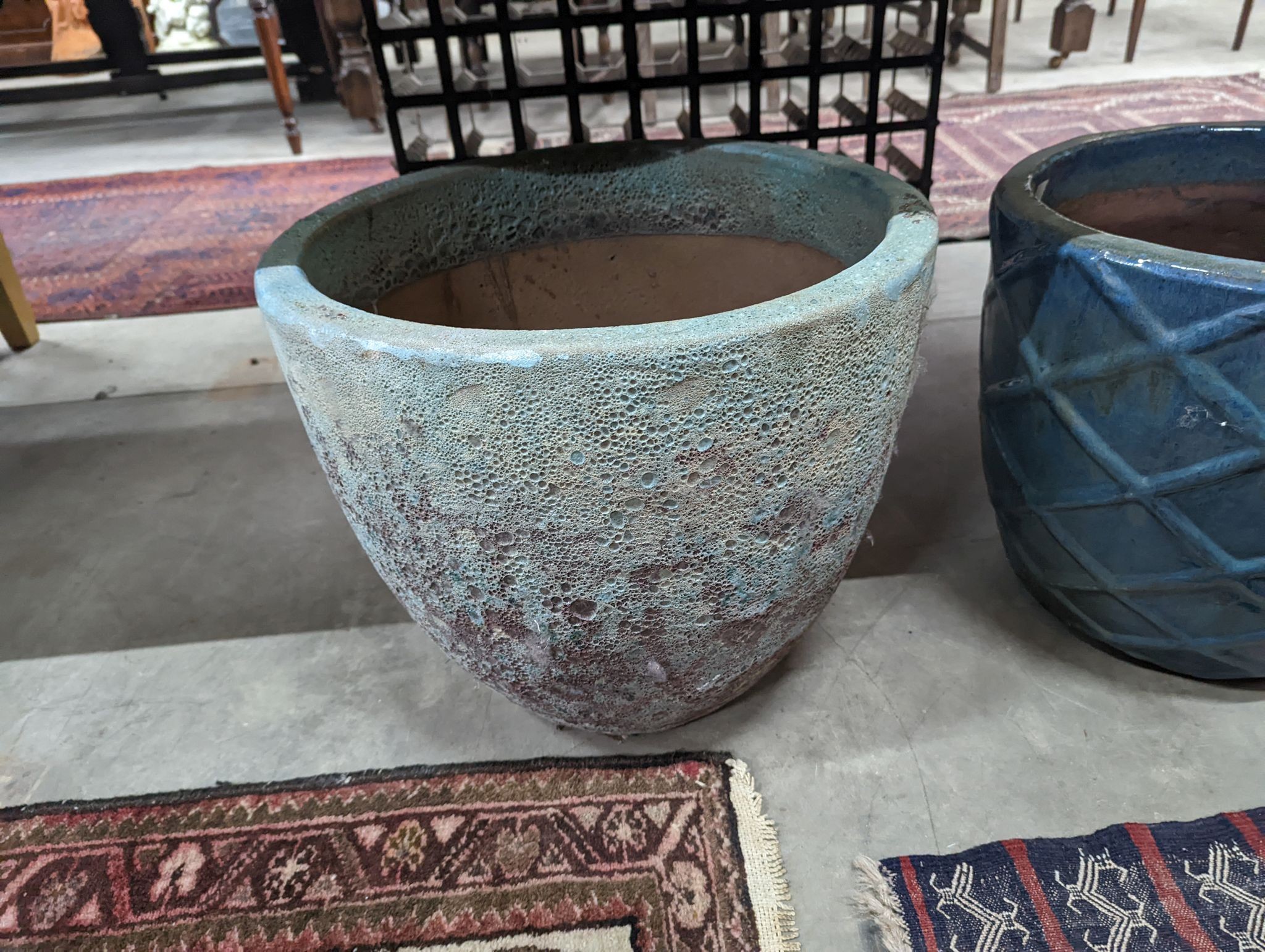 Three glazed earthenware garden planters, largest diameter 45cm
